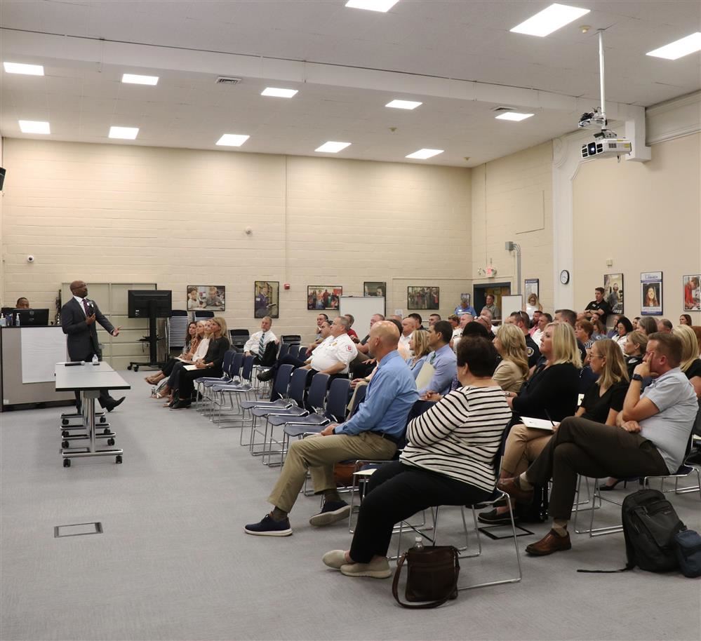  Rockwood representatives and first responders listen to a presentation by Dr. Curtis Cain